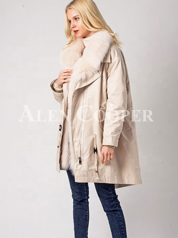 Long and comfortable super warm fur hooded winter parka for women in White side view