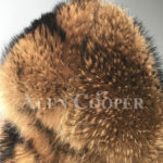 Real raccoon fur winter outerwear with stylish hood for women close view