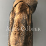 Real raccoon fur winter outerwear with stylish hood for women side view