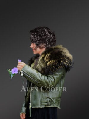 Women’s super stylish super soft super warm real leather jacket with raccoon fur collar in green side view New