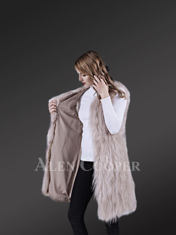 Womens mid-length super warm and stylish raccoon fur winter outerwear side view