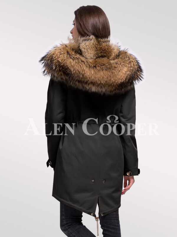 Women’s striking fashion statements with Finn raccoon fur hybrid black parka convertibles back side view