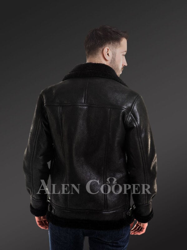 Stylish mid-length shearling coats for men with merino fur lining back side view