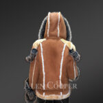 Ladies’ stylish tan shearling jackets with fox fur cuffs back side view