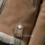 Brown Toscana shearling coat blending feminism with style Side views