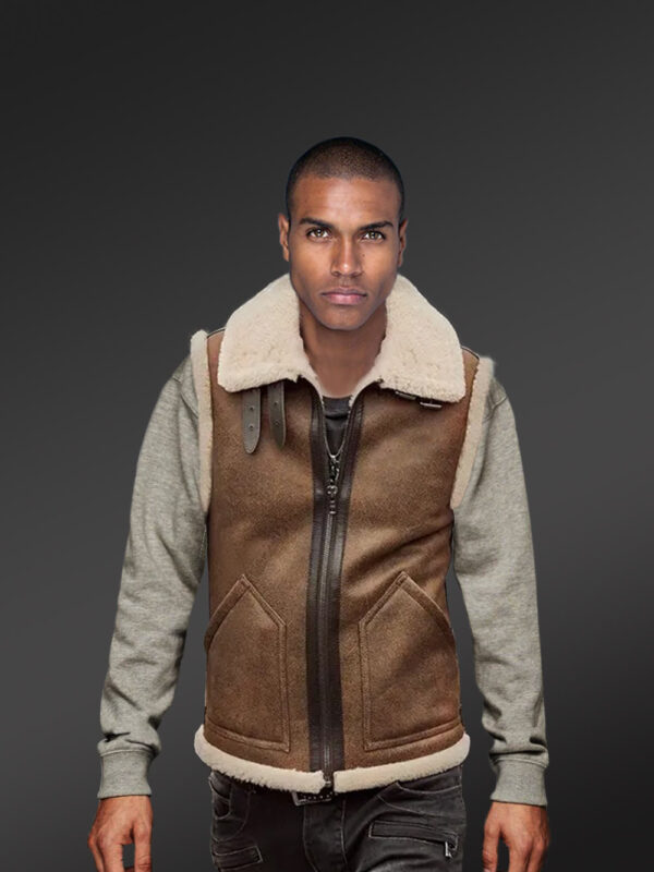The Vintage finish Tan shearling vest Men serves as a perfect fit with wool detailing on the collar. Tan Shearling Vest Men