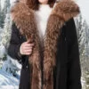 Women’s elegant brown parka with soft raccoon fur hood and long collar